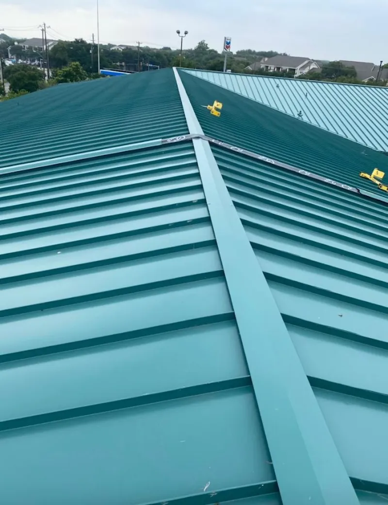 Green commercial metal roof ridge and valley for Metal Roof Repair in Minnetrista
